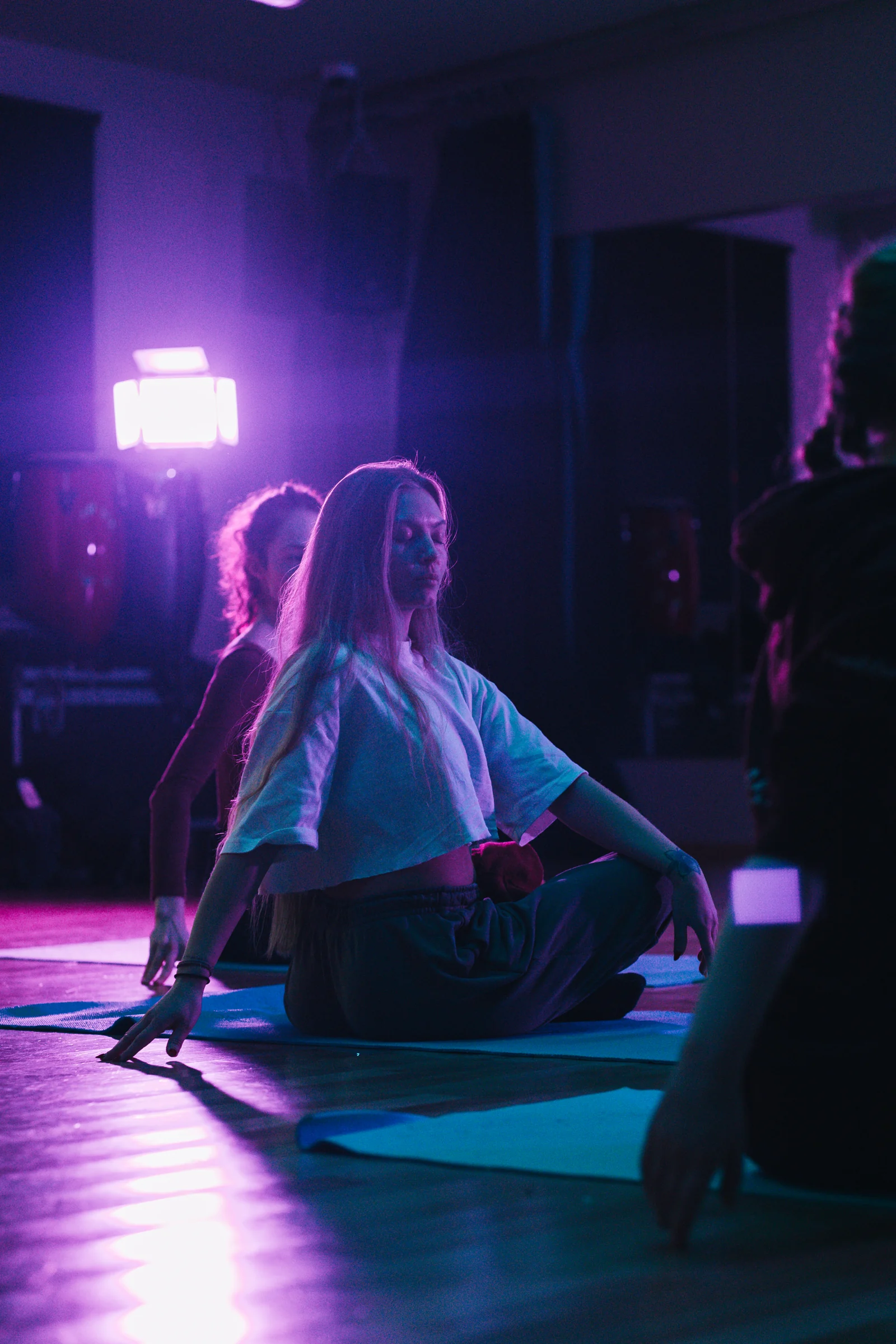A quiet seated moment in the Pilates studio
